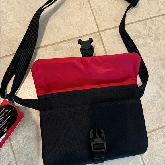 MANHATTAN PORTAGE crossbody.  Black with red lining. - Picture 7 of 9